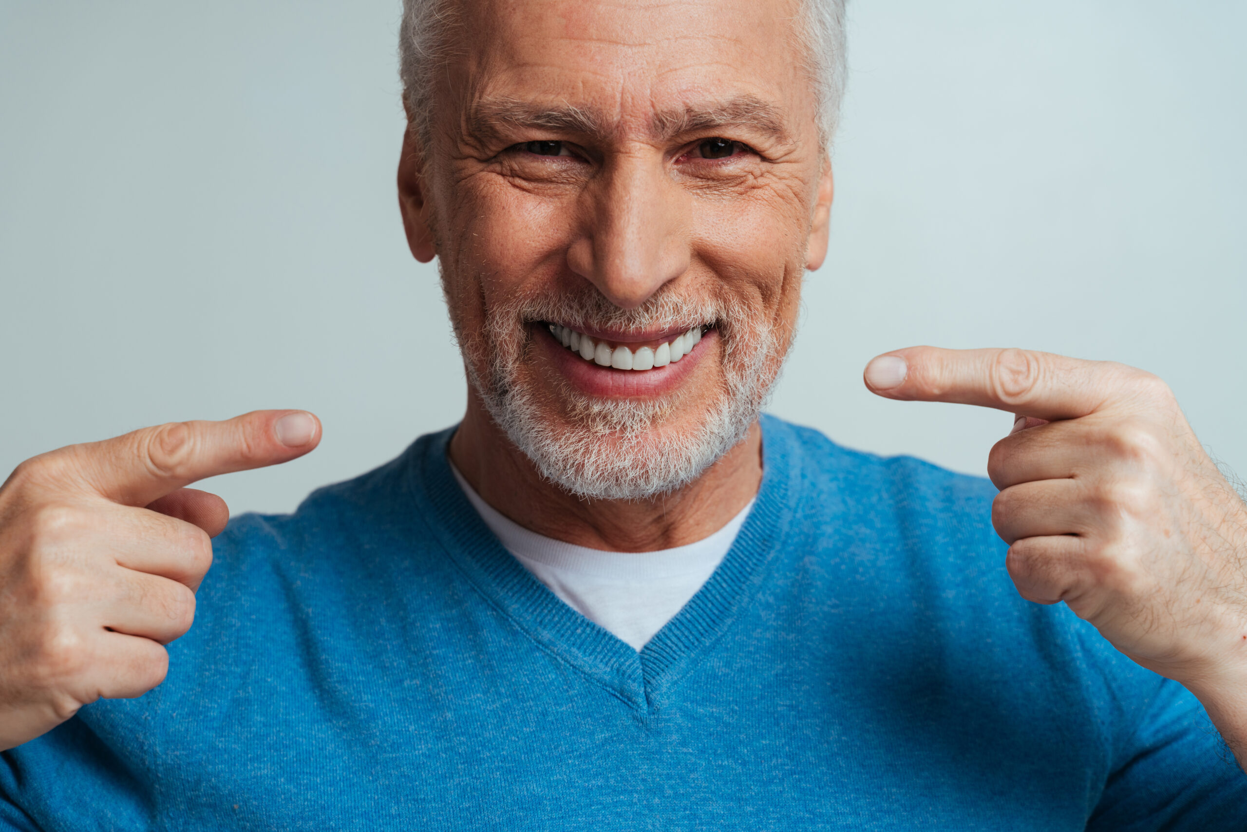 Featured image for “Implant-Supported Dentures in Fort Saskatchewan: How Are They Different From Conventional Dentures?”